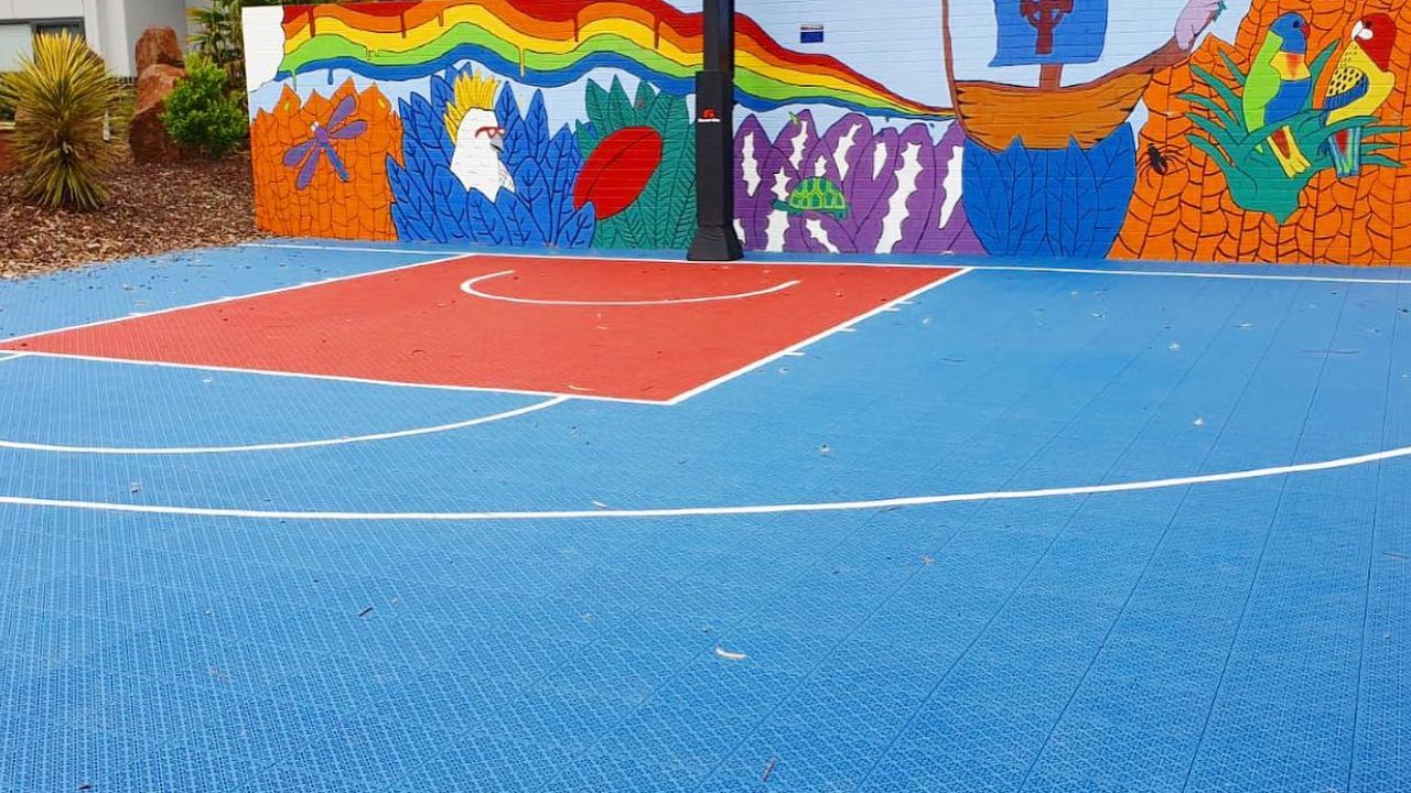 Can You Please Describe the Specifications of the Volleyball Court Flooring?
